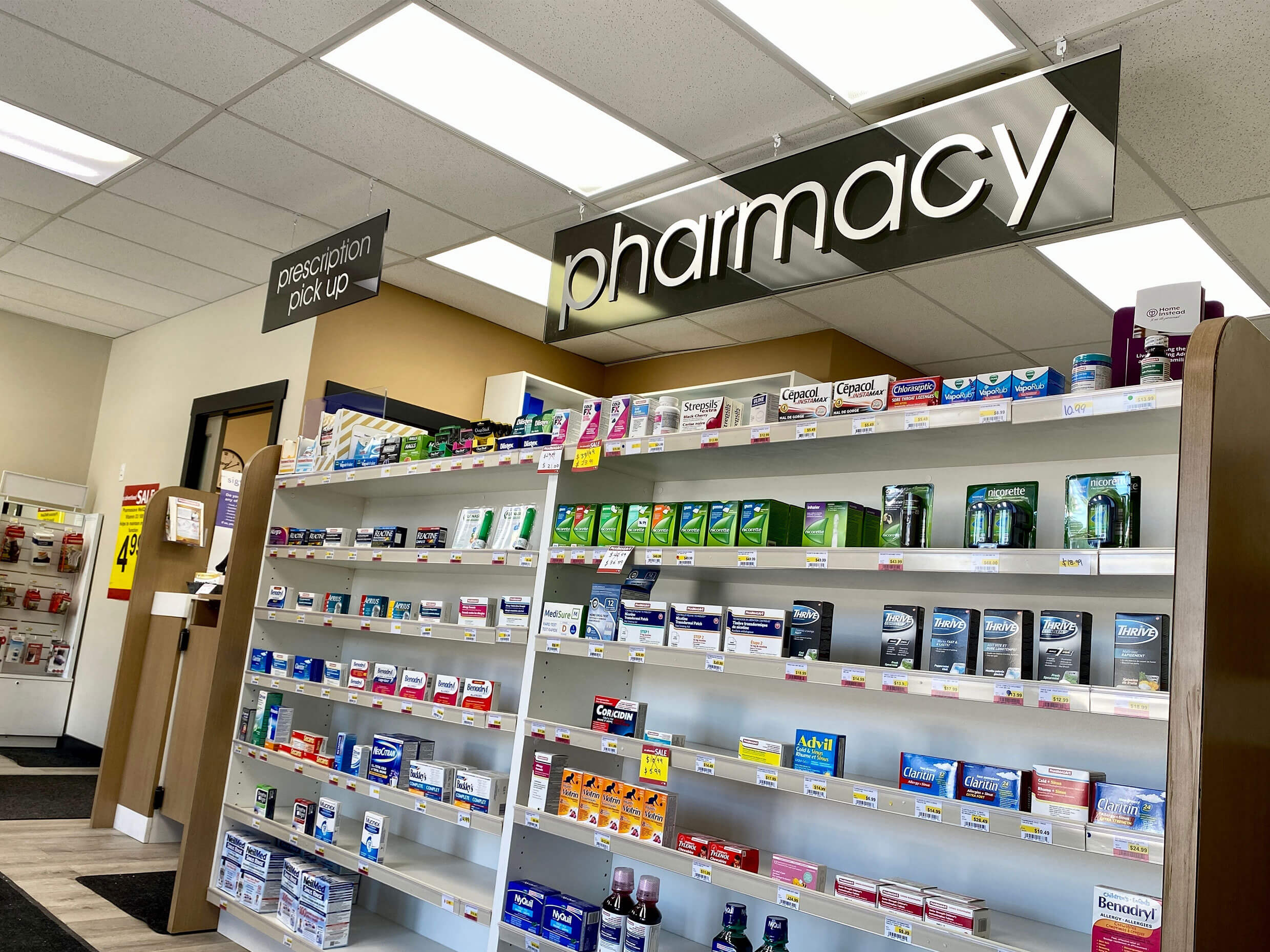 The view of a pharmacy shelf at a community pharmacy in Calgary, Alberta, where graduates of a Pharmacy Assistant Diploma can work and facilitate access to life-saving medication