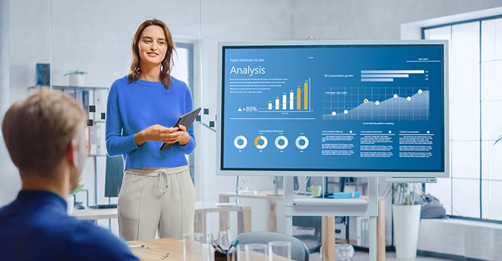 Social media manager presenting performance metrics in a marketing meeting.
