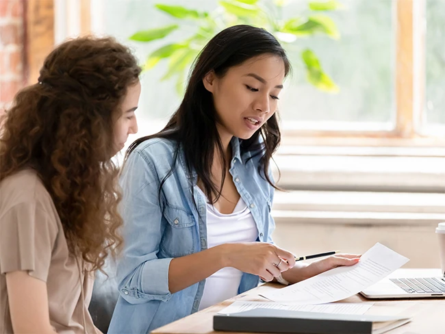 A student speaking with an advisor.