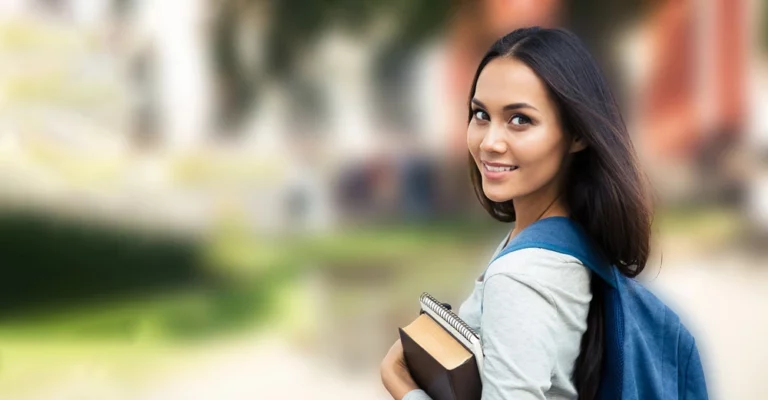 a woman with a backpack and books start your studies