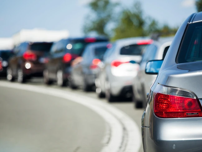 a row of cars on a road