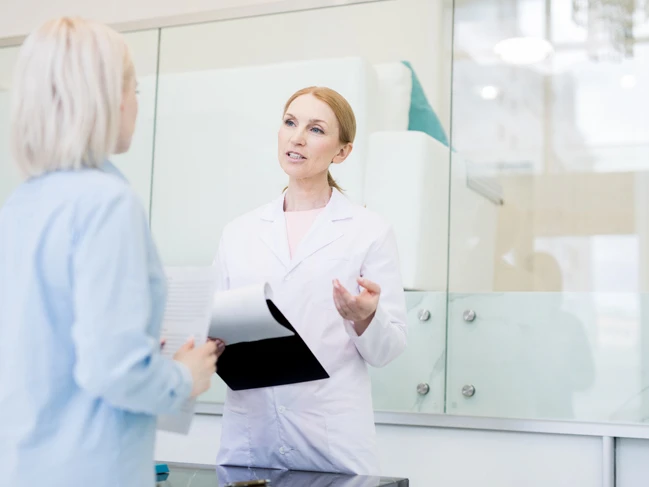 Medical office assistant with patient