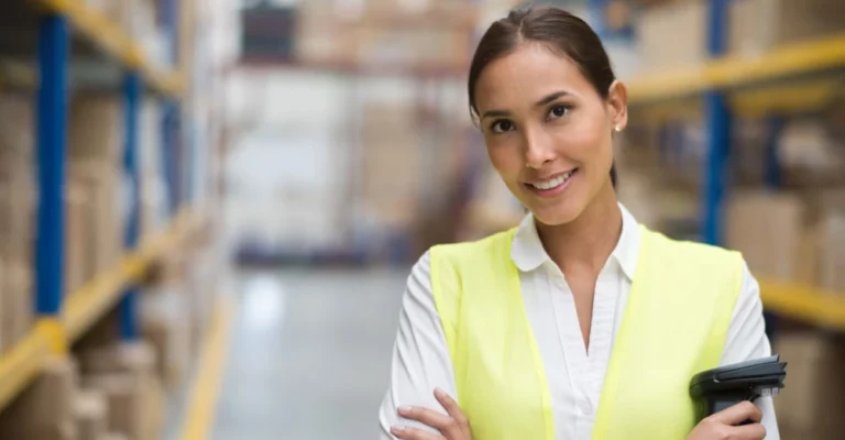a woman in a yellow vest supply chain management