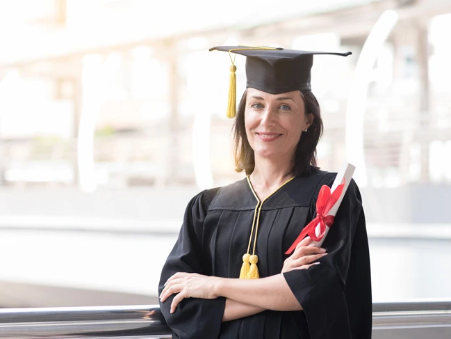 a woman in a graduation gown