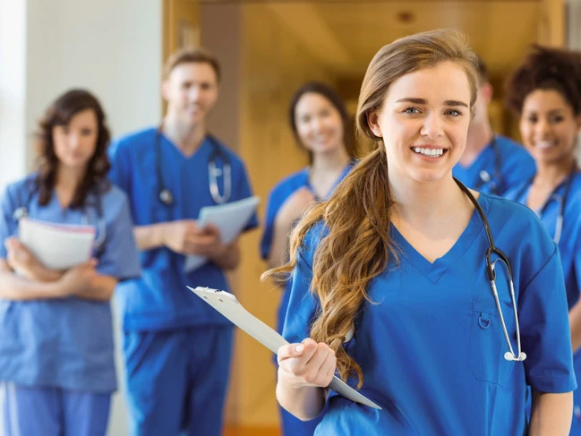 group of medical students standing together in college