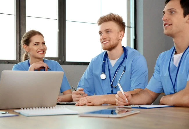 medical office assistant students studying in group