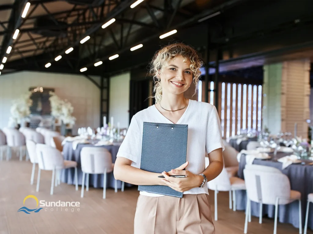 female event planner in the banquet hall