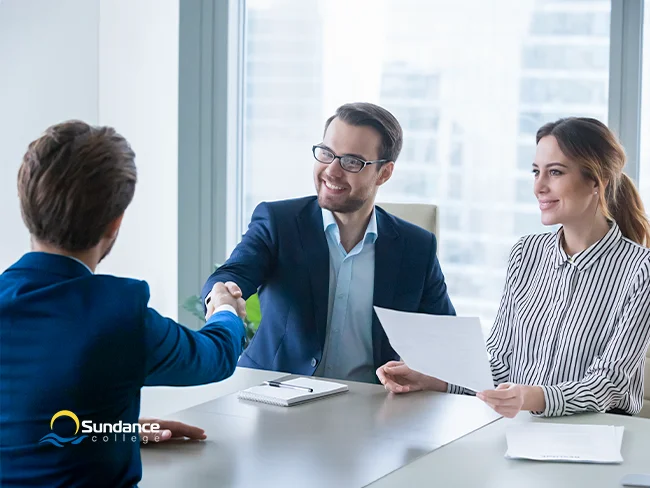 business manager handshaking with a job candidate 1