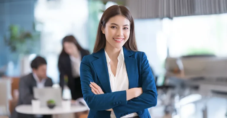 Smiling female professional, representing career training success with diploma programs and flexible learning.