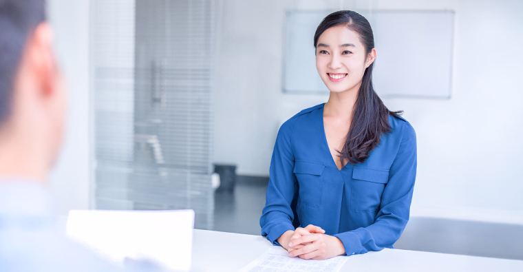 A career college graduate using the STAR technique to answer behavioural interview questions.