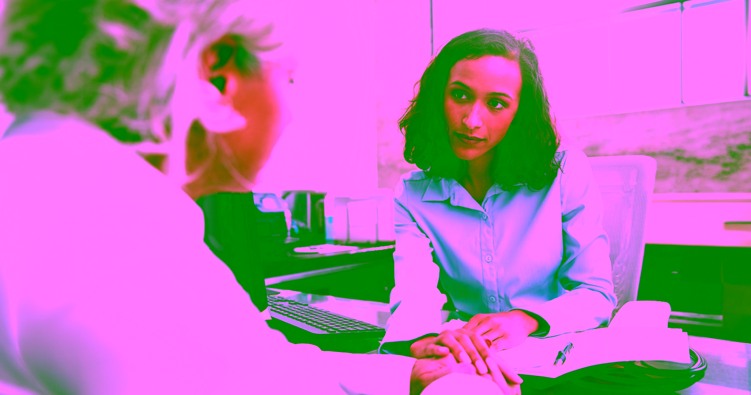 An addictions and community health professional helping a client with intake and assessment.
