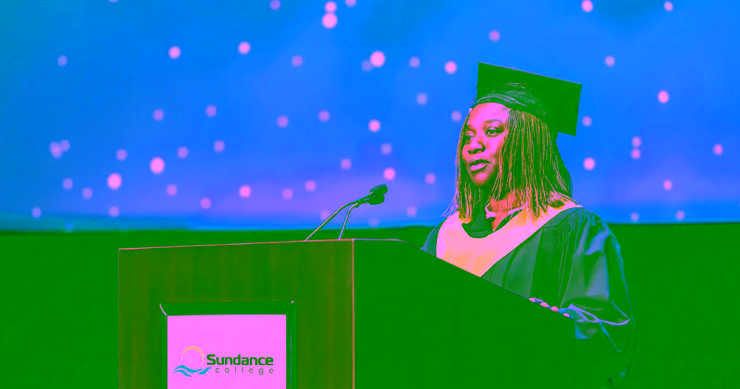 Tolulope O., a Sundance College graduate with Honours from the Addictions and Community Health Professional Diploma program, giving a speech at the graduation ceremony in Winnipeg.